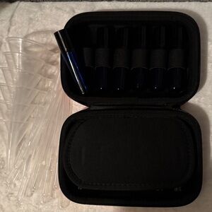 Pink and Black Travel Case with 12 Blue Roll On Bottles with Funnels Pipettes
